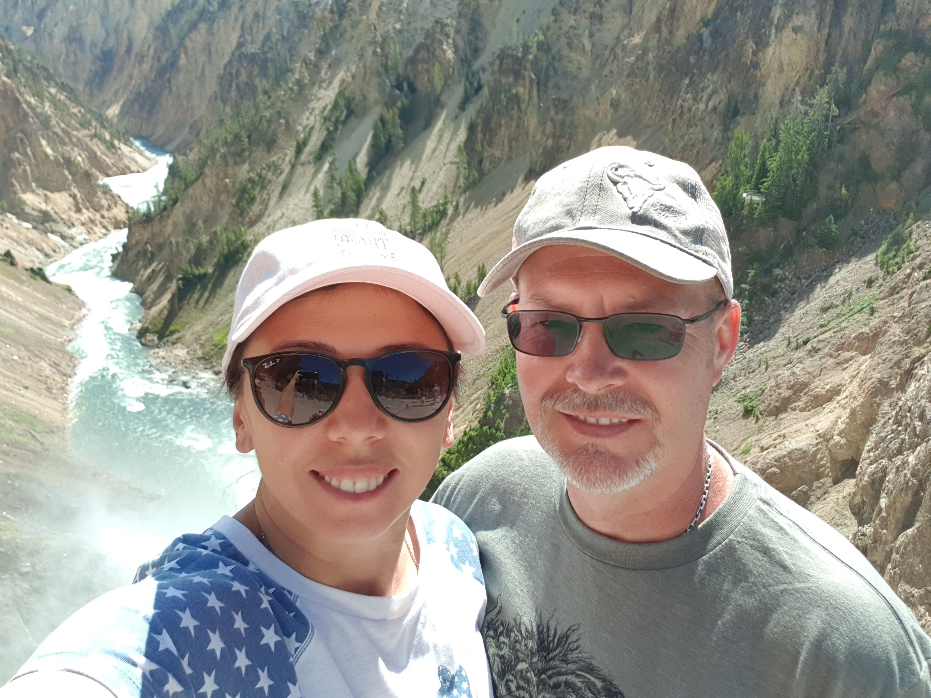 Ganna and Bradley Harrison take a photo together in Yellowstone National Park in Wyoming on July 30, 2019.