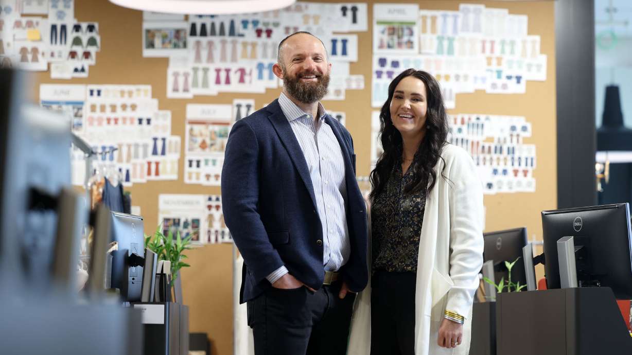 Sam and Kacie Malouf pose for a photo in the area of their headquarters dedicated to the brand Downeast as they show the different sections of their business in Nibley near Logan on Tuesday, Jan. 18.