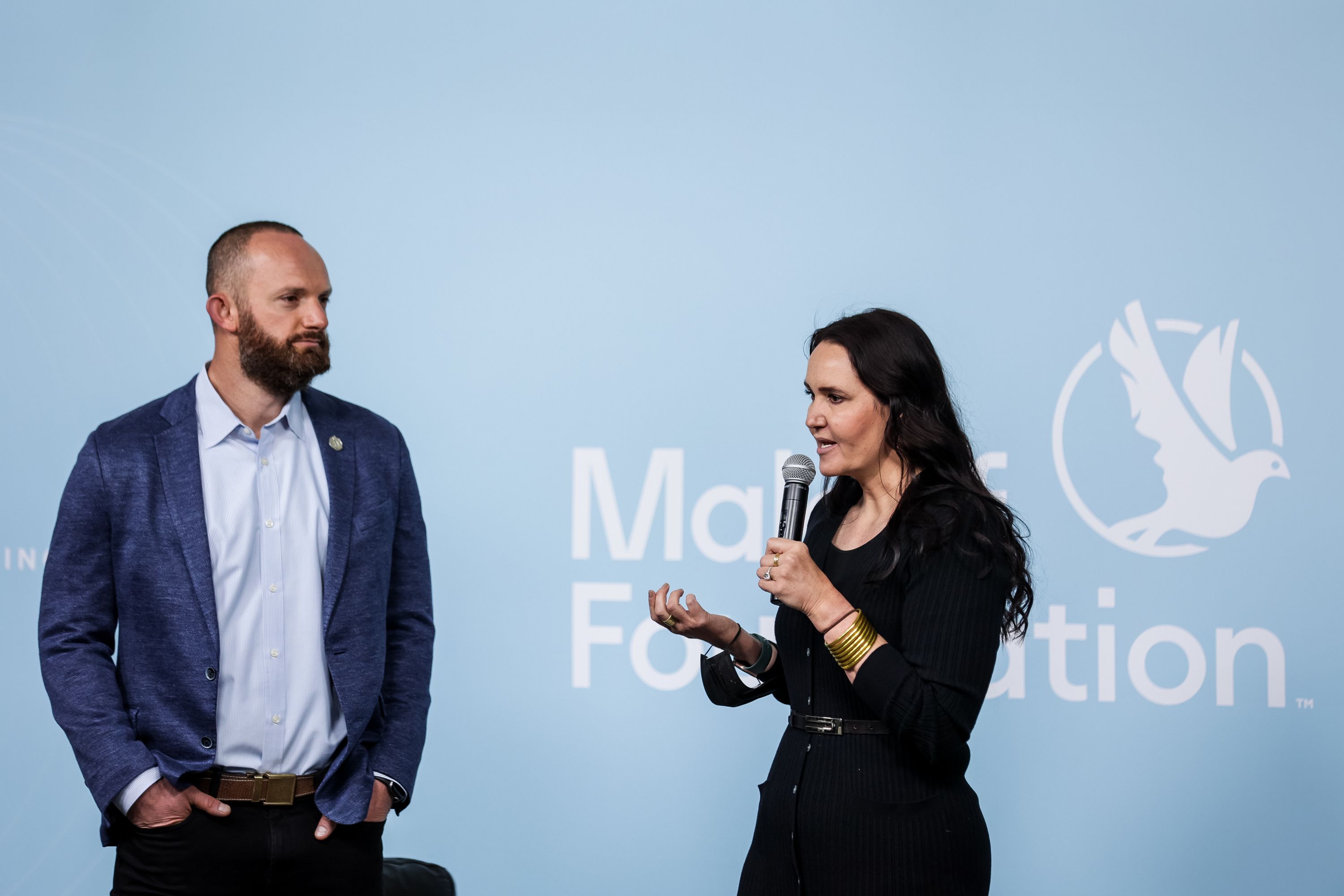 Sam and Kacie Malouf, co-chairs and founders of the Malouf Foundation, welcome people to the Human Trafficking Policy and Education Summit at the Malouf Foundation in Logan on Saturday, April 17, 2021.