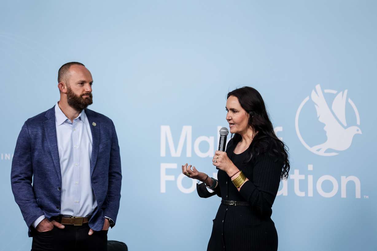 Sam and Kacie Malouf, co-chairs and founders of the Malouf Foundation, welcome people to the Human Trafficking Policy and Education Summit at the Malouf Foundation in Logan on Saturday, April 17, 2021.