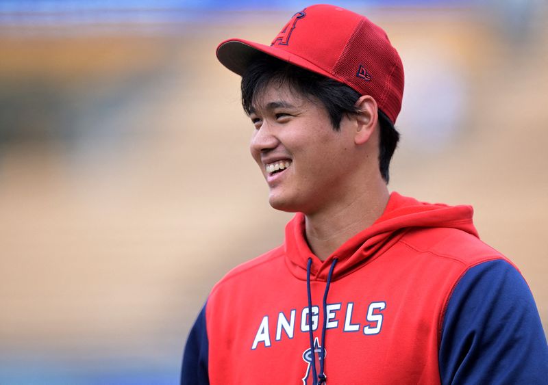 FILE PHOTO: Apr 4, 2022; Los Angeles, California, USA;  Los Angeles Angels designated hitter Shohei Ohtani (17) looks on during warm up before the game against the Los Angeles Dodgers at Dodger Stadium.