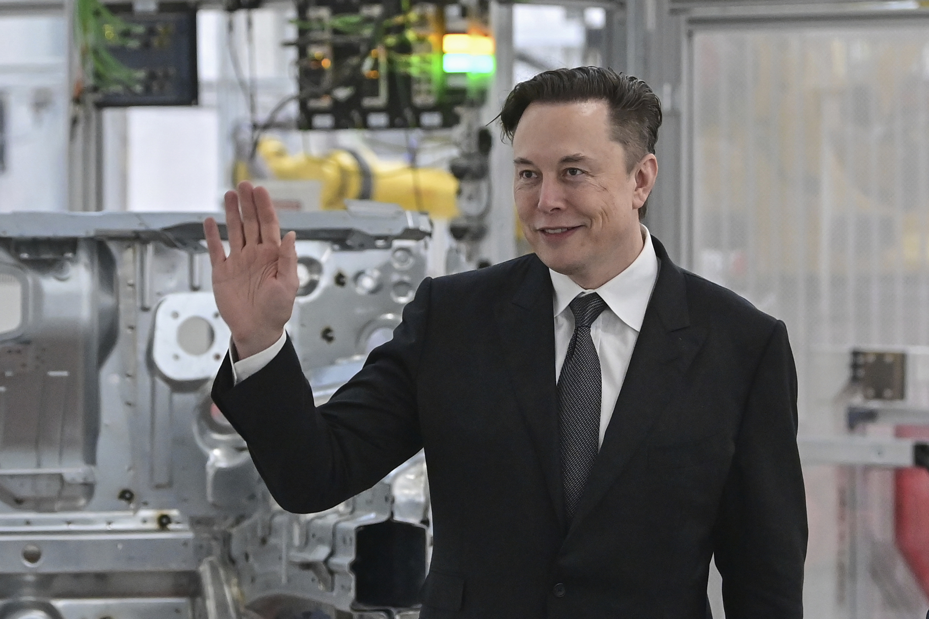 Tesla CEO Elon Musk attends the opening of the Tesla factory Berlin Brandenburg in Gruenheide, Germany, March 22. Musk is joining Twitter's board of directors, one day after reports said he took a 9% stake in the social media platform.