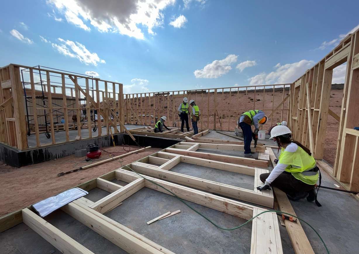 University of Utah architecture students work on the Horseshoe Project near Bluff, Utah. In December, six U. students completed the expandable home on the Navajo Nation that includes a greenhouse, a wood-burning stove, an outdoor fire pit and a water catchment to collect rainwater.