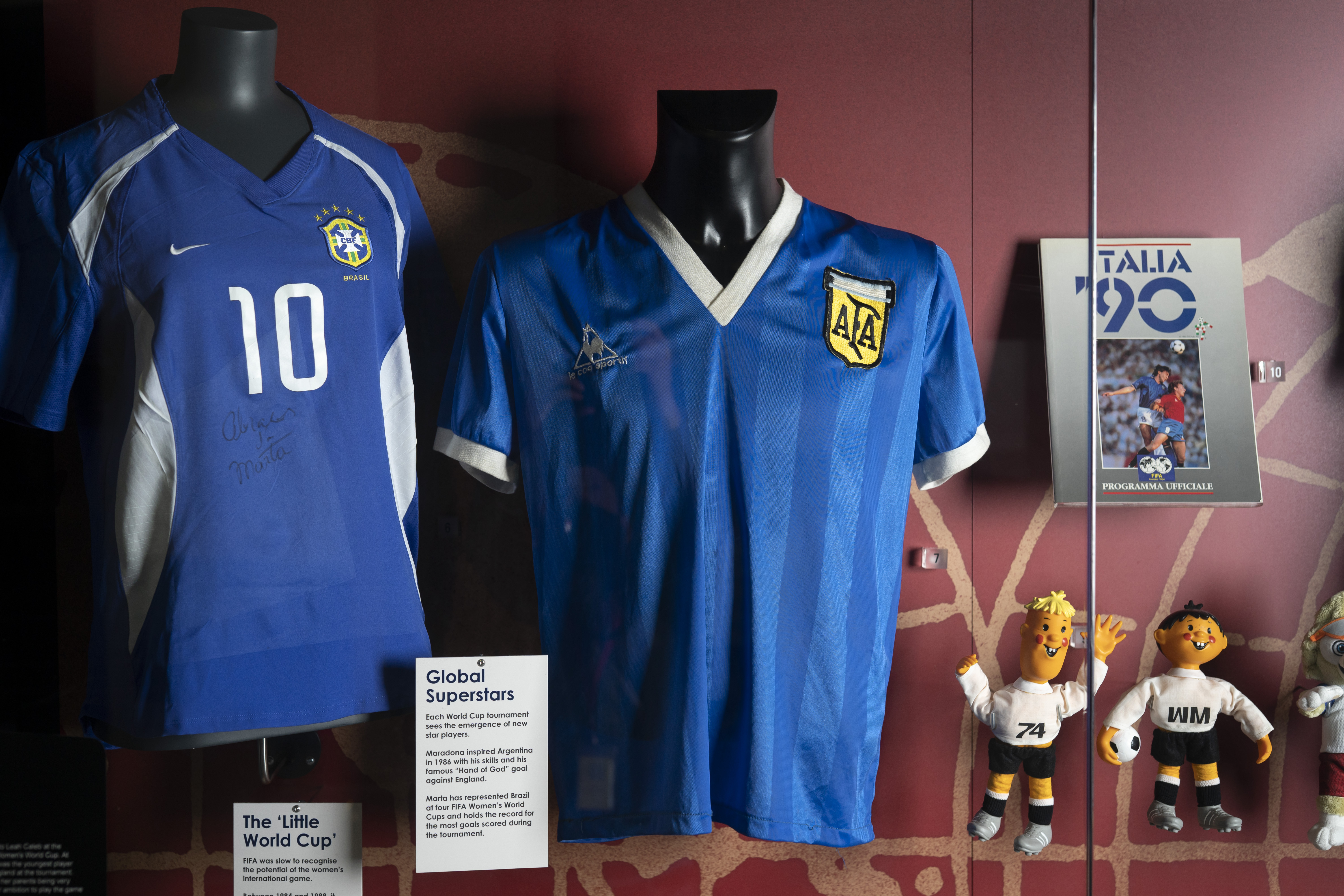 FILE - The soccer shirt, center, worn by Argentina's Diego Maradona in the 1986 World Cup quarterfinal against England is displayed at the National Football Museum in Manchester, England Nov. 26, 2020. The shirt worn by Diego Maradona when he scored the controversial “Hand of God” goal against England in the 1986 World Cup is for sale for the first time. Auctioneer Sotheby’s said Wednesday, April 6, 2022 that the jersey could fetch more than 4 million pounds ($5.2 million) in an online auction that opens April 20. 