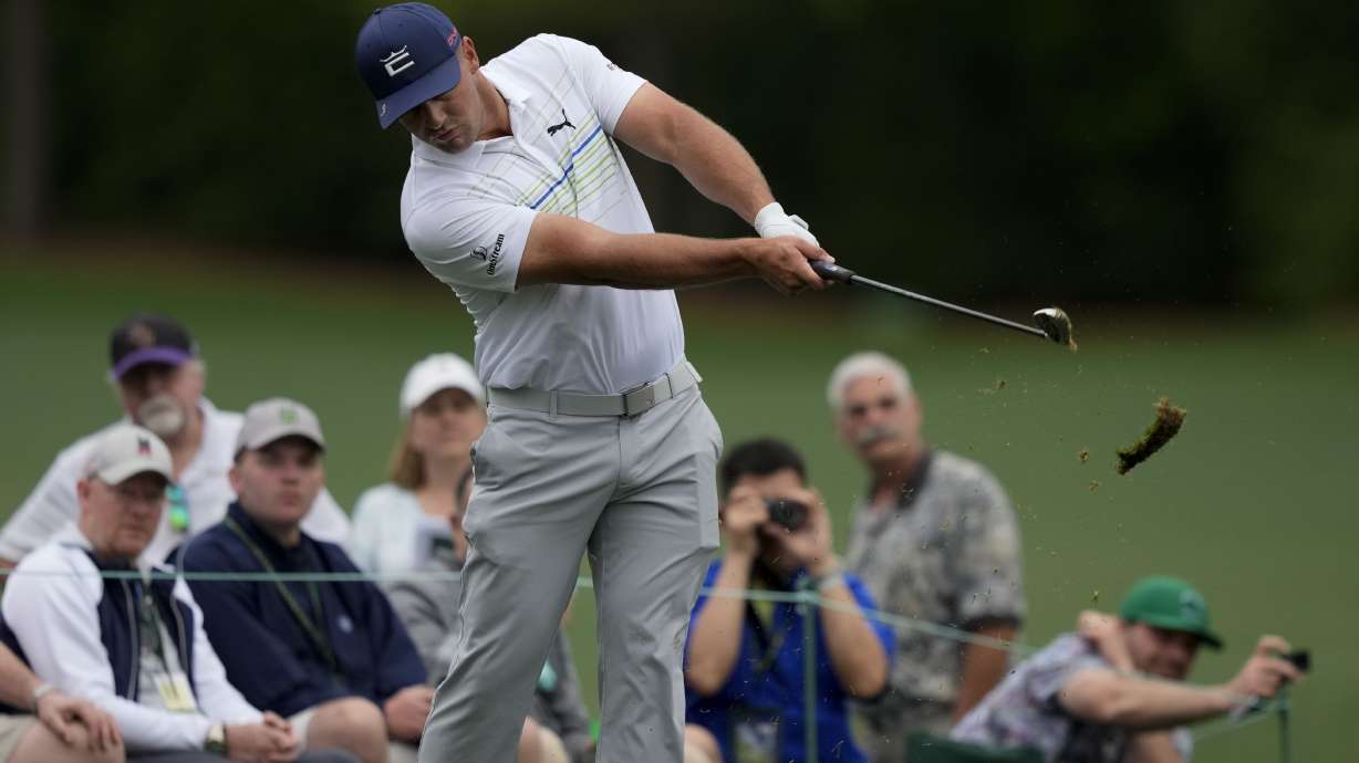 Bryson DeChambeau hits on the 12th tee during a practice round for the Masters golf tournament on Wednesday, April 6, 2022, in Augusta, Ga.