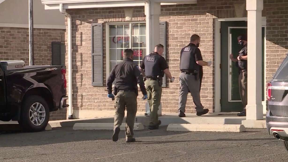 Police officers are seen at Small Rainbow in Orem on Feb. 4, 2021. At least six people were arrested following an investigation into several massage parlors in Utah County that police say were fronts for human trafficking and prostitution. Despite public perceptions that human trafficking is an “international problem,” it is occurring in urban and rural areas of Utah, according to a new report.
