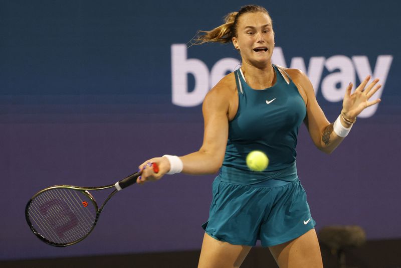 FILE PHOTO: Mar 24, 2022; Miami Gardens, FL, USA; Aryna Sabalenka hits a forehand against Irina-Camelia Begu (ROU) (not pictured) in a second round women's singles match in the Miami Open at Hard Rock Stadium.