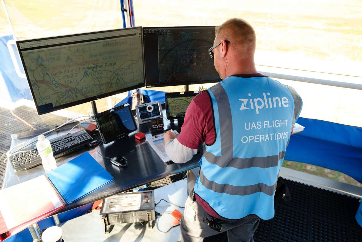 A drone pilot works on drone testing inside the Zipline flight operations facility in Pea Ridge, Ark., in this undated handout photo.