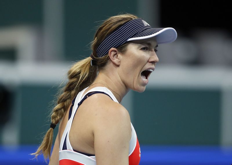 FILE PHOTO: Tennis - Billie Jean King Cup - Finals - O2 Arena, Prague, Czech Republic - November 5, 2021 Danielle Collins of the U.S. reacts in her match against Russian Tennis Federation's Anastasia Pavlyuchenkova during the semi final