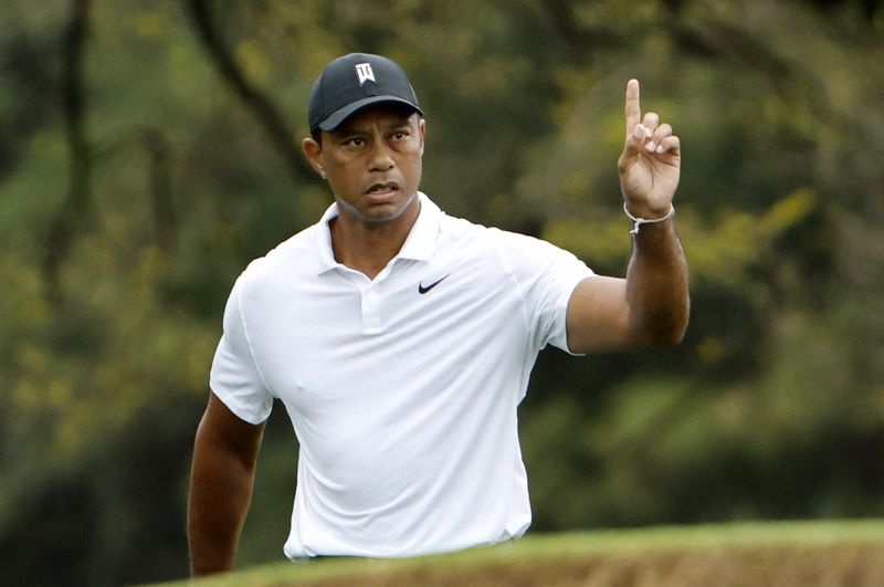 Golf - The Masters - Augusta National Golf Club - Augusta, Georgia, U.S. - April 6, 2022 Tiger Woods of the U.S. reacts after his shot on the 18th during a practice round