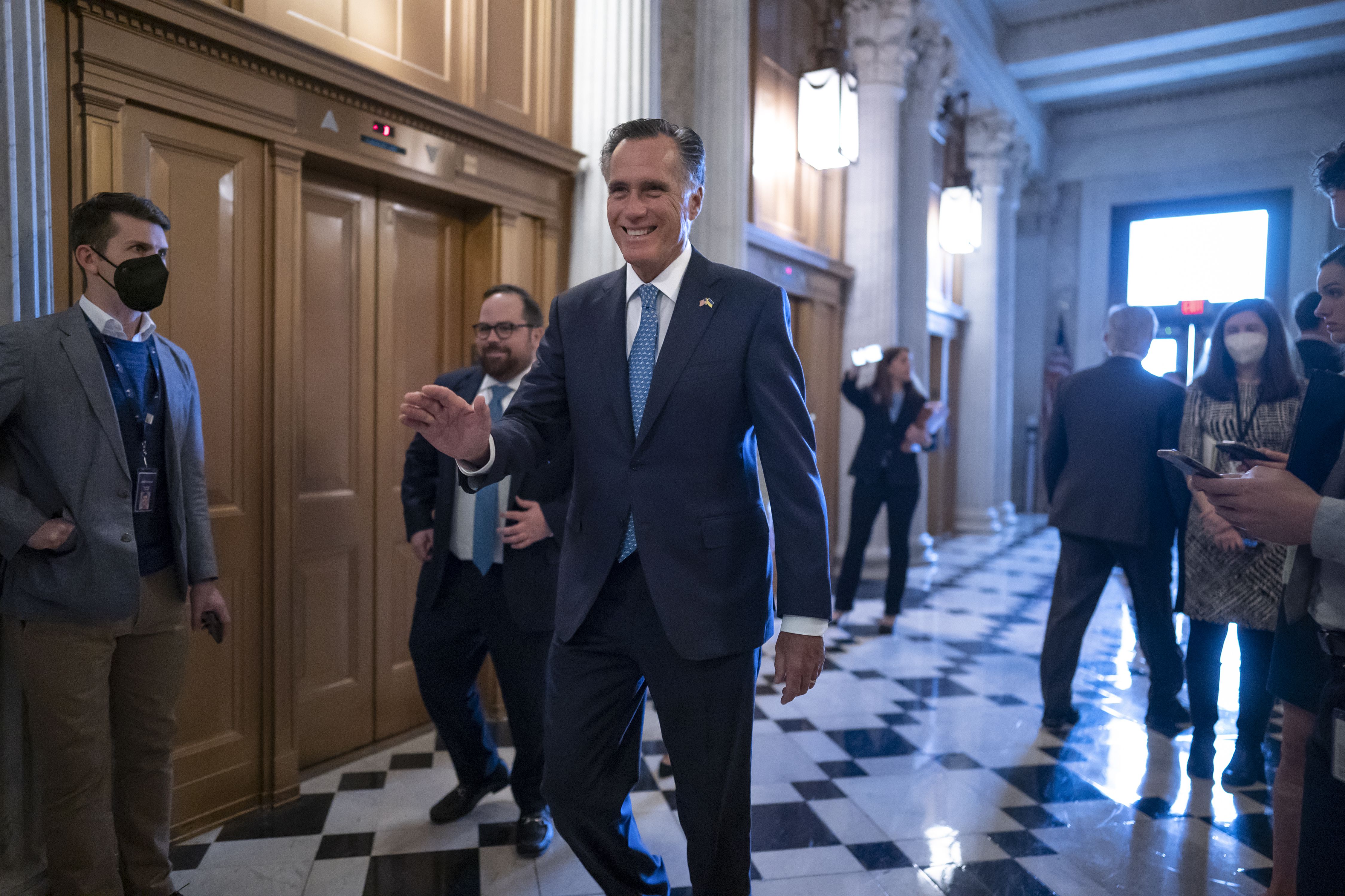 Sen. Mitt Romney, R-Utah, arrives at the Senate chamber during a flurry of roll call votes, at the Capitol in Washington Thursday. Romney is one of three Republicans who voted to confirm Supreme Court nominee Ketanji Brown Jackson.