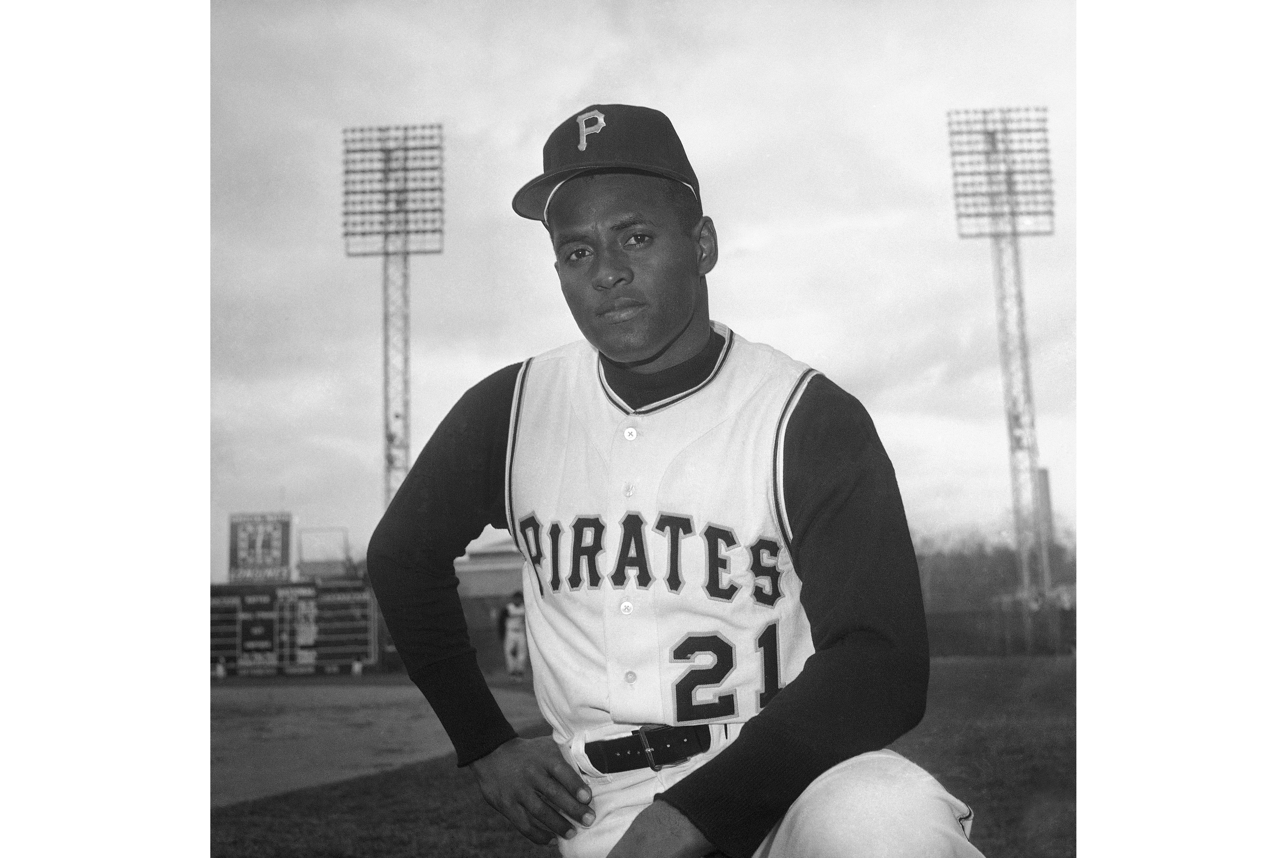 FILE - Roberto Clemente of the Pittsburgh Pirates is seen in Tampa, Fla., March 3, 1963. Winners of the Roberto Clemente Award will wear his No. 21 on back of their caps for the rest of their major league careers. Major League Baseball made the announcement Thursday, April 7, 2022, saying it was a “special tribute to his enduring legacy.” 