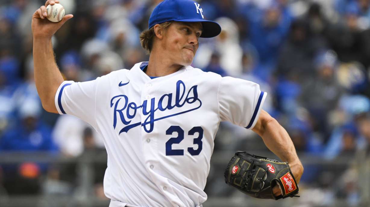 Kansas City Royals starting pitcher Zack Greinke throws against the Cleveland Guardians during the first inning of a baseball game, Thursday, April 7, 2022 in Kansas City, Mo.