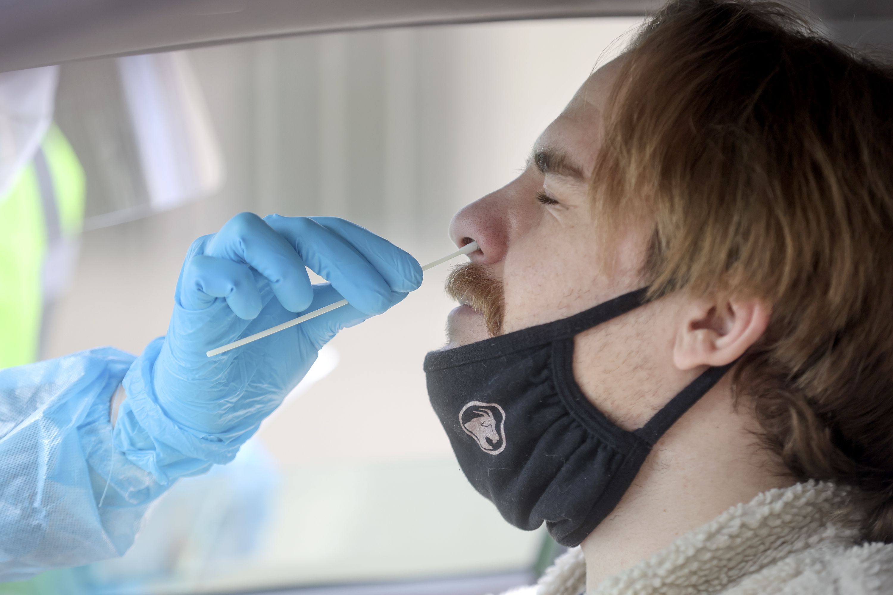 Daniel Martin gets tested for COVID-19 at a Nomi Health testing site outside of the Utah Department of Health building in Salt Lake City on Wednesday, March 16.