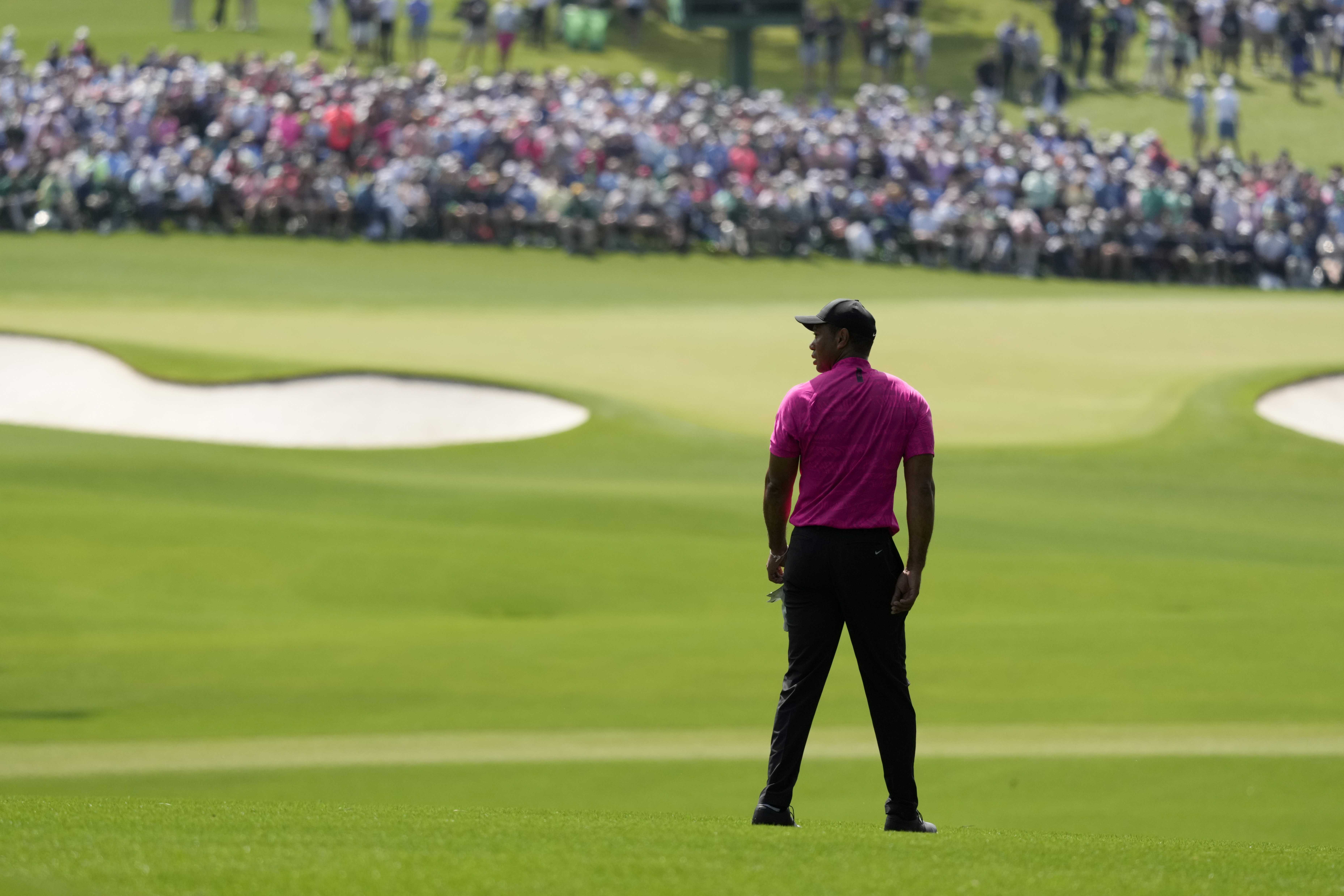 Tiger Woods waits to play on the second fairway during the first round at the Masters golf tournament on Thursday, April 7, 2022, in Augusta, Ga. 