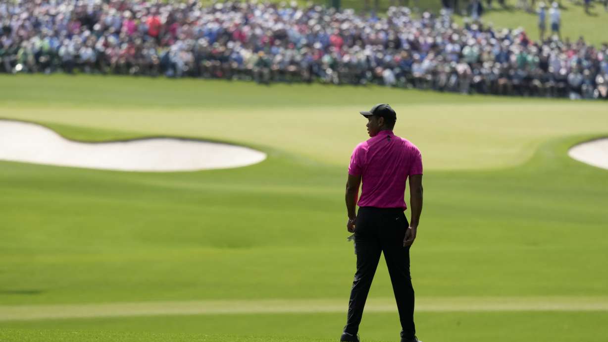 Tiger Woods waits to play on the second fairway during the first round at the Masters golf tournament on Thursday, April 7, 2022, in Augusta, Ga.