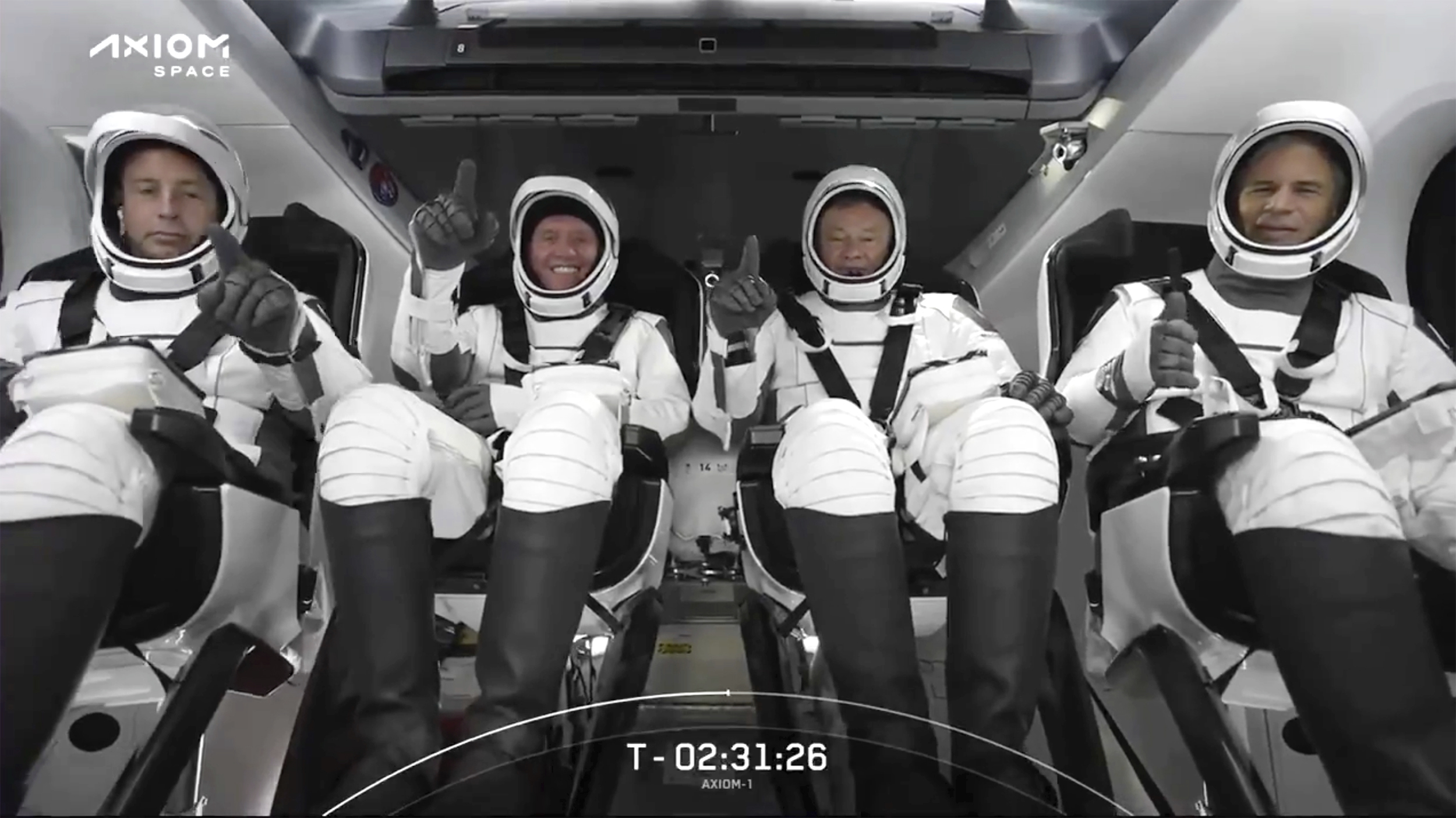 The SpaceX crew are seated in the Dragon spacecraft on Friday in Cape Canaveral, Fla. The eSpaceX launched three rich businessmen and their astronaut escort to the International Space Station for more than a week’s stay.  