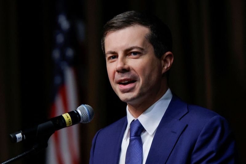U.S. Transportation Secretary Pete Buttigieg speaks to attendees during the National Action Network National Convention in New York, Friday. Two airplane passengers accused of hitting and biting crew and other passengers are facing a total of nearly $160,000 in fines, U.S. officials announced Friday.