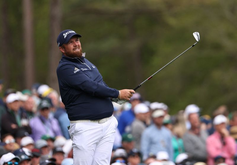 Golf - The Masters - Augusta National Golf Club - Augusta, Georgia, U.S. - April 8, 2022 Ireland's Shane Lowry tees off on the 12th during the second round