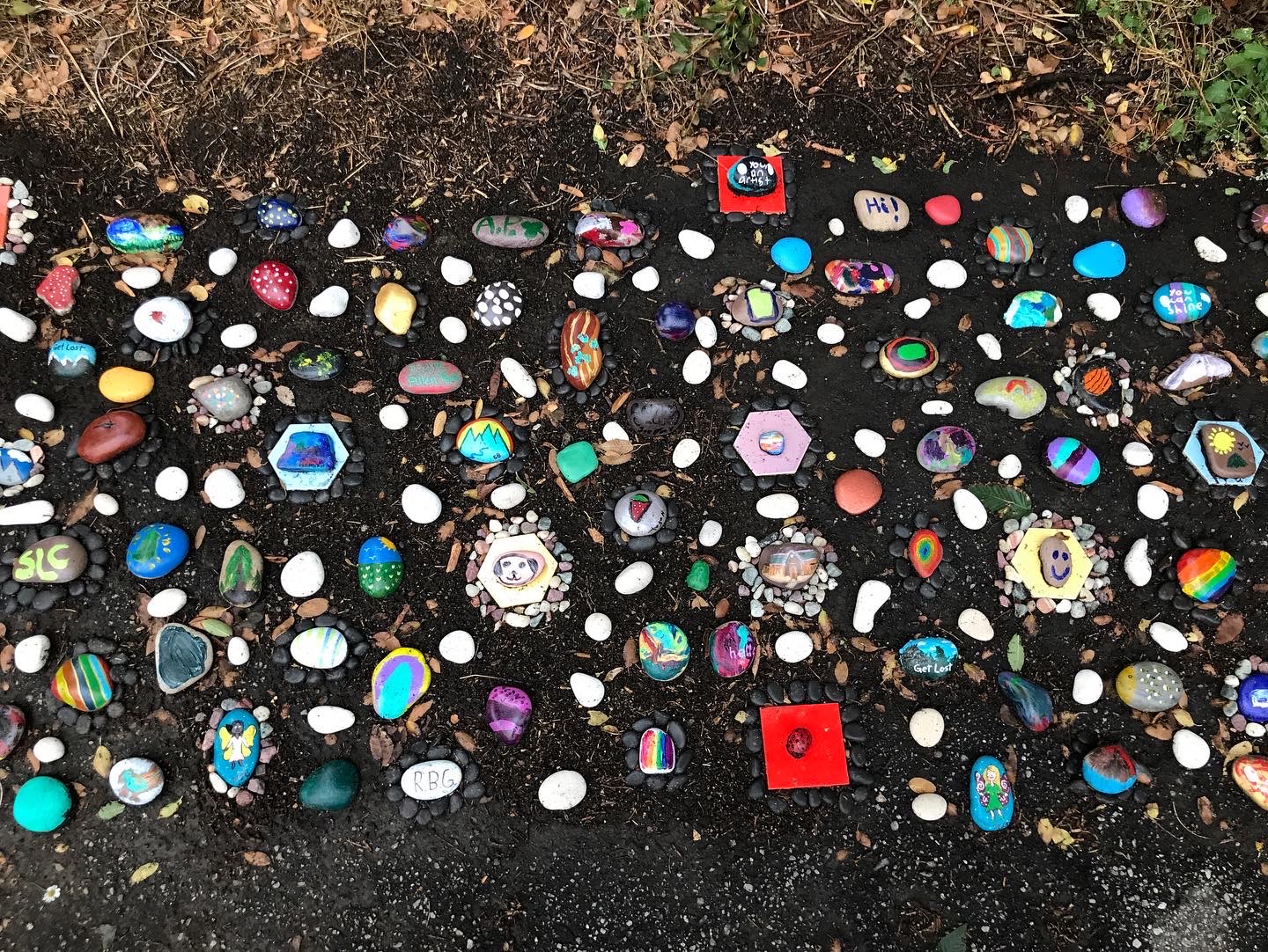 A collection of painted rocks at Allen Park in Salt Lake City on March 24, 2022. The collection is one of over a hundred unique findings that Salt Lake City resident Bryant Heath has mapped out in a collection of unusual sights. 