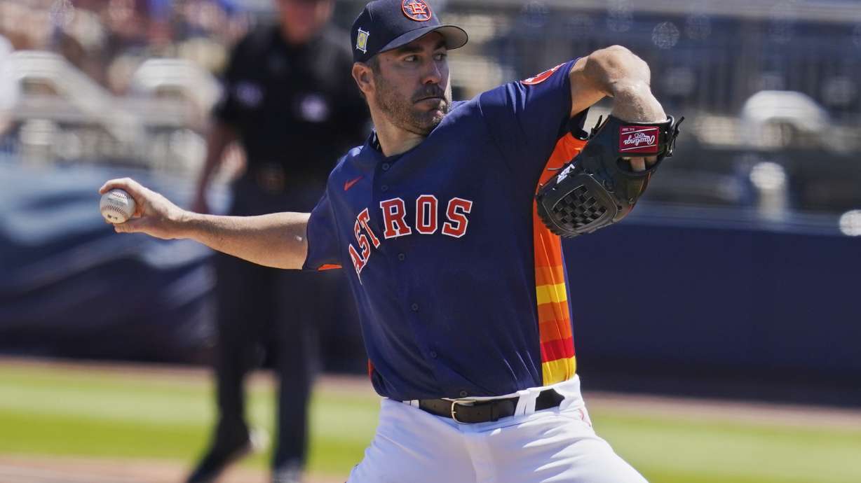 Houston Astros' Justin Verlander pitches in the second inning of a spring training baseball game against the Washington Nationals, Tuesday, March 29, 2022, in West Palm Beach, Fla.