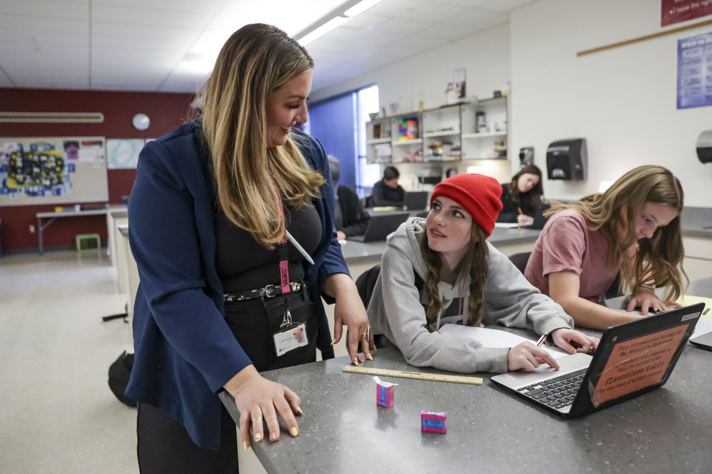 Middle school teacher Alisha Wheeler talks to eighth grade student Storie Shovan during her class at Copper Mountain Middle School in Herriman on Friday.