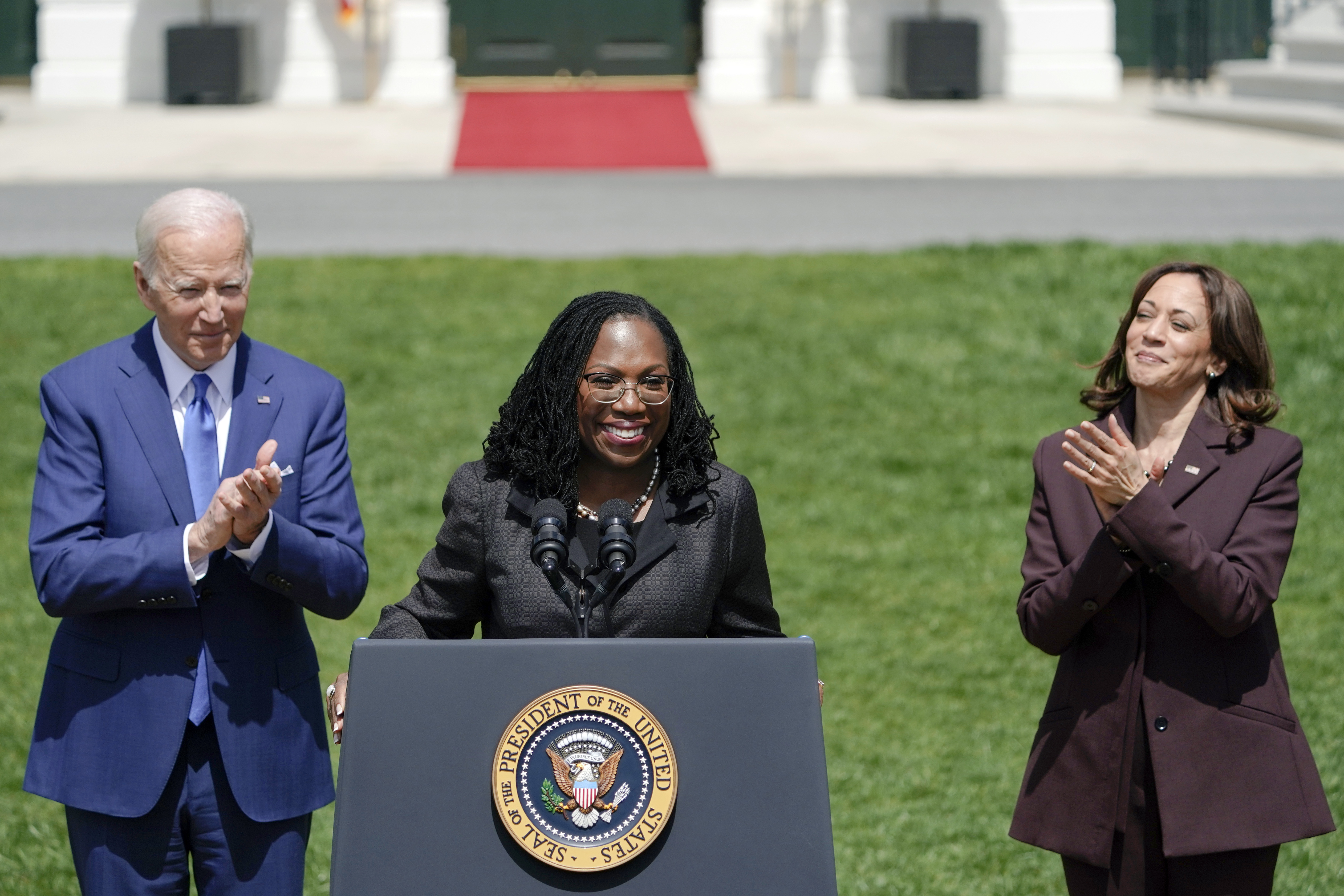 President Joe Biden and Vice President Kamala Harris applaud Judge Ketanji Brown Jackson as Jackson speaks during an event on the South Lawn of the White House in Washington, Friday celebrating the confirmation of Jackson as the first Black woman to reach the Supreme Court. 
