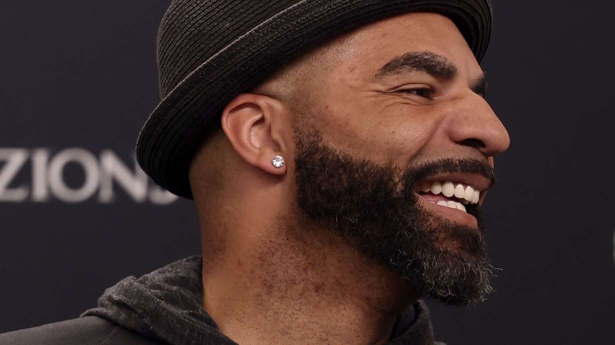 Carlos Boozer speaks to reporters at Vivint Arena in Salt Lake City on Friday, April 8, 2022. Boozer was honored during the third quarter of the Jazz game.