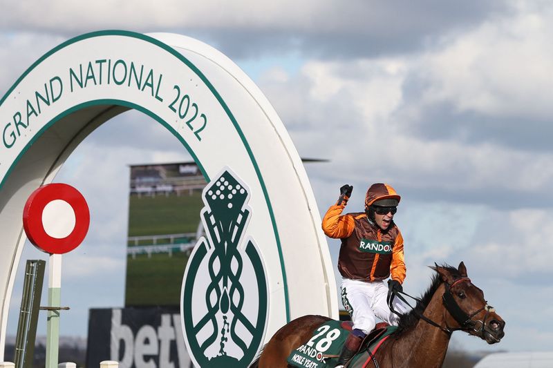 Horse Racing - Grand National Festival 2022 - Aintree Racecourse, Liverpool, Britain - April 9, 2022 Sam Waley-Cohen celebrates on Noble Yeats winning the 17:15 Randox Grand National Handicap Chase