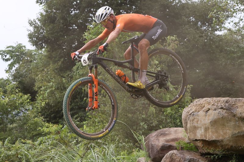 FILE PHOTO: Tokyo 2020 Olympics - Mountain Bike - Men's Cross Country - Final - Izu MTB Course - Shizuoka, Japan - July 26, 2021.  Milan Vader of the Netherlands in action.