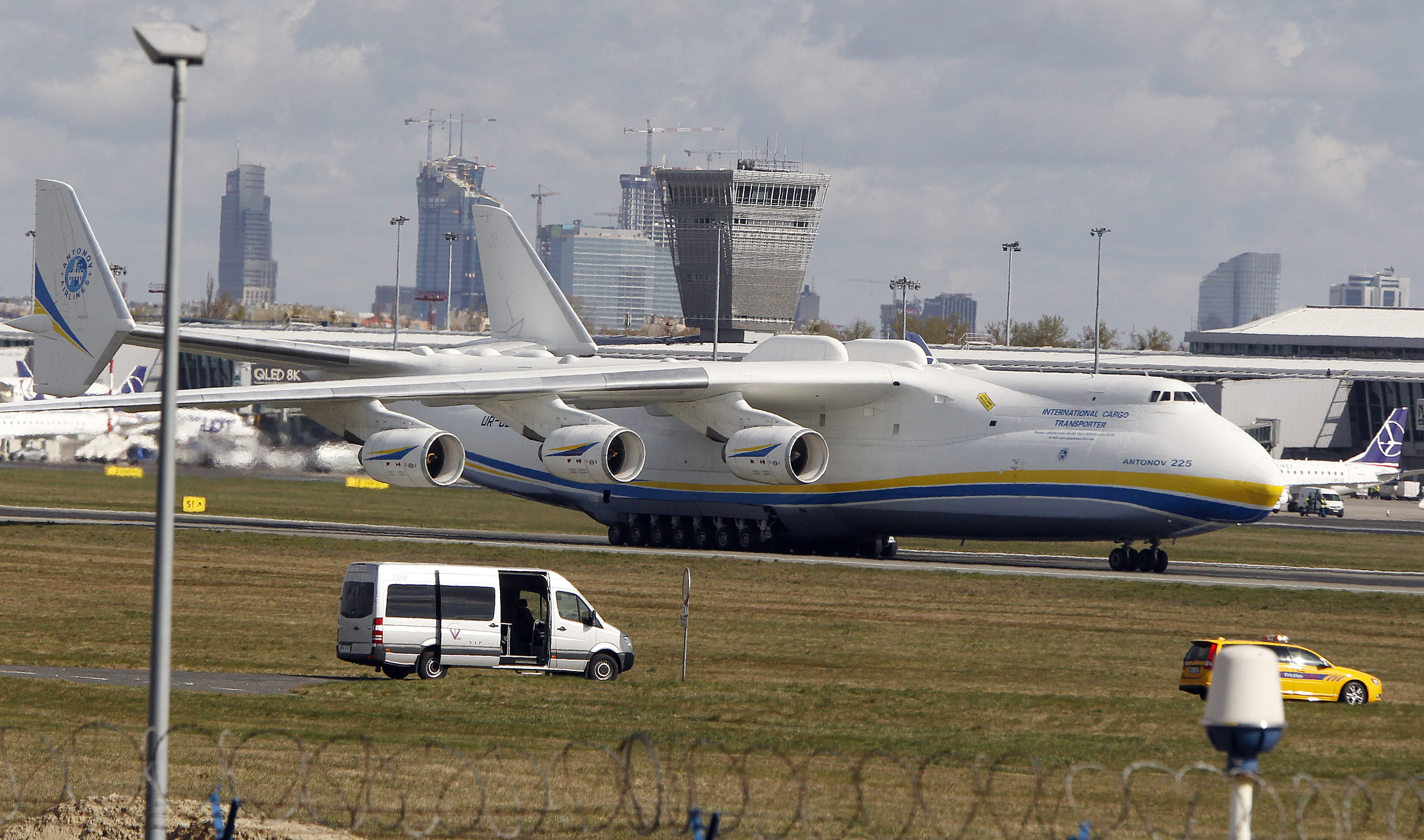 The now-destroyed world's largest cargo plane, the Soviet-made Antonov An-225 Mriya that belonged to Ukraine, lands at the Frederic Chopin airport, in Warsaw, Poland, April 14, 2020. Poland's air travel authorities are warning travelers of possible flight delays and cancellations at Warsaw's airport due to a protest and some flight controllers quitting their jobs.