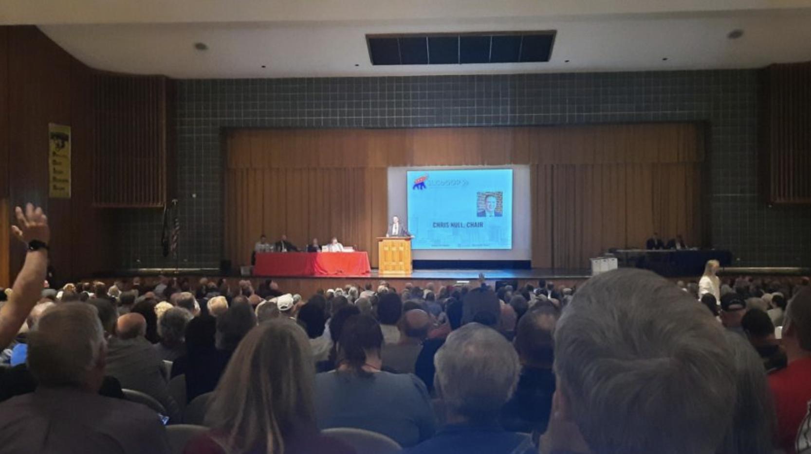 Two men were caught trying to vote more than once in the paper ballot primary race for county clerk at the Salt Lake County GOP Convention Saturday at Kearns High School, the chairman said.