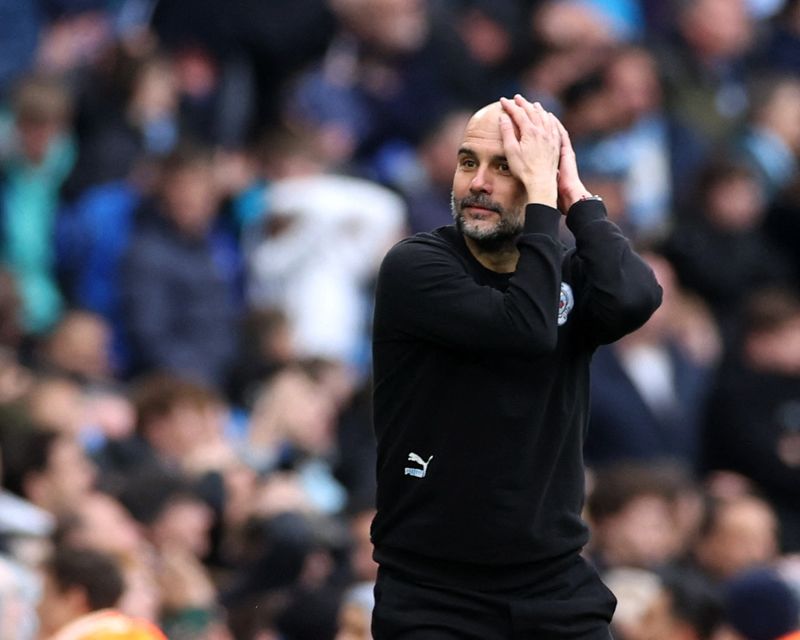 Soccer Football - Premier League - Manchester City v Liverpool - Etihad Stadium, Manchester, Britain - April 10, 2022 Manchester City manager Pep Guardiola reacts Action Images via Reuters/Carl Recine EDITORIAL USE ONLY. No use with unauthorized audio, video, data, fixture lists, club/league logos or 'live' services. Online in-match use limited to 75 images, no video emulation. No use in betting, games or single club /league/player publications.  Please contact your account representative for further details.