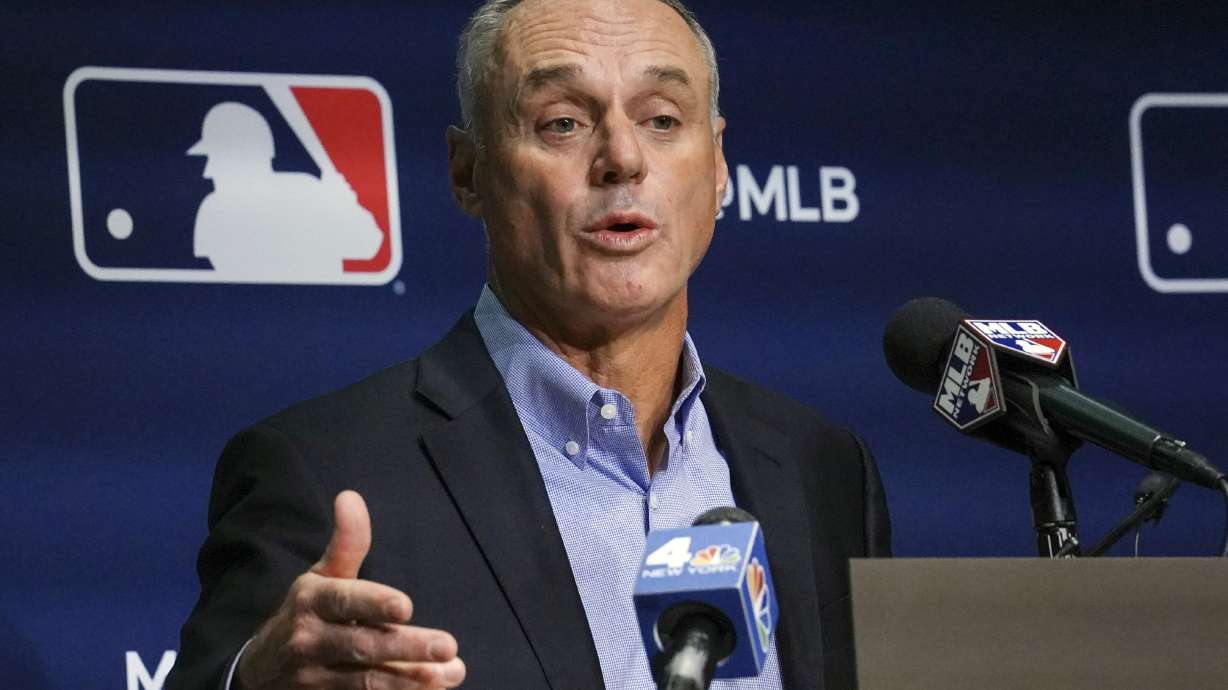 FILE -Major League Baseball commissioner Rob Manfred speaks during a news conference, Thursday March 10, 2022, in New York. About 1 in 4 fans of Major League Baseball feel at least some anger toward the sport after its first work stoppage in a generation, according to a new poll, but the vast majority are still excited about the new season. Only 27% of Americans say they are currently a fan of MLB, according to the poll from The Associated Press-NORC Center for Public Affairs Research. Baseball Commissioner Rob Manfred apologized to fans when the labor agreement was reached on March 10.