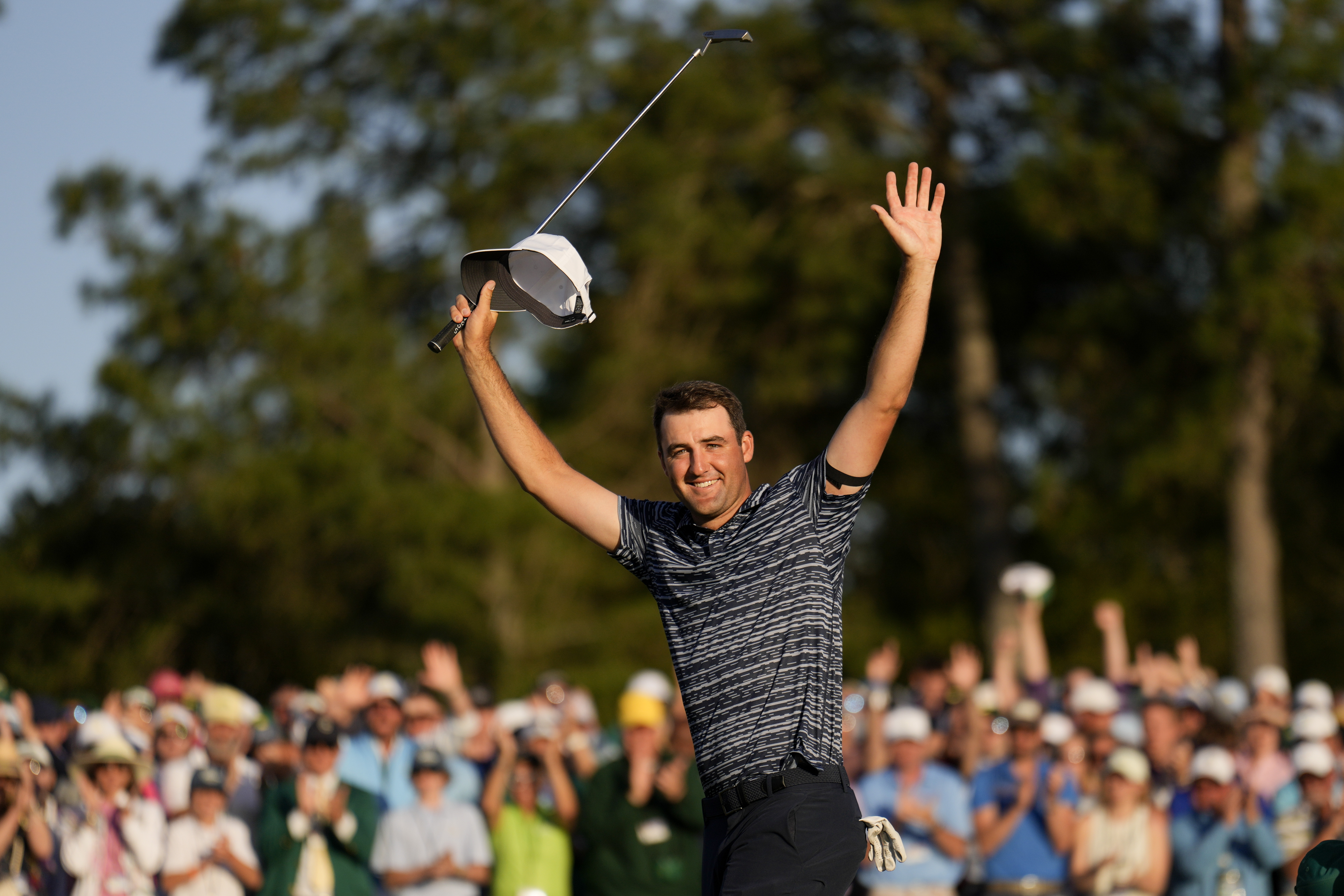 Scottie Scheffler celebrates after winning the 86th Masters golf tournament on Sunday, April 10, 2022, in Augusta, Ga. 
