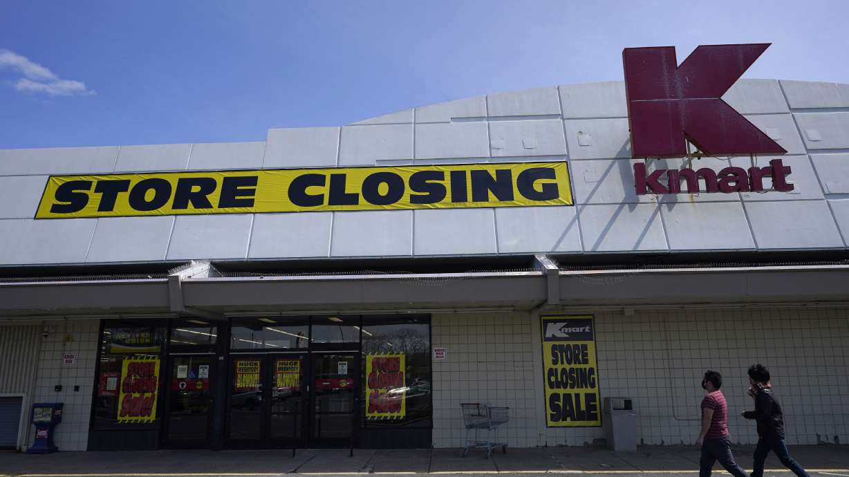 People walk into a Kmart in Avenel, N.J., April 4. When the New Jersey store closes its doors on April 16, it will leave only three remaining U.S. locations for the former retail powerhouse.