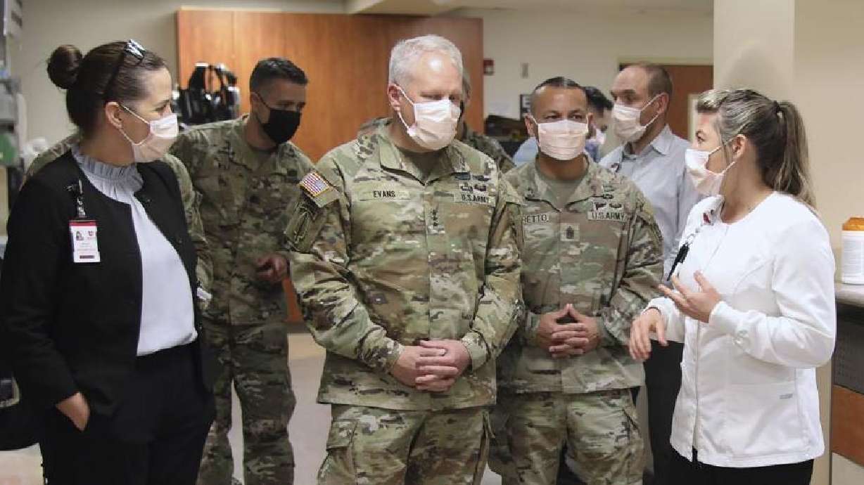University of Utah Health staff speak with the U.S. Army North personnel in Salt Lake City on March 2, during a visit to the University of Utah Hospital. The U.S. military is taking lessons from the COVID-19 pandemic to prepare for the next crisis threatening a large population, whatever its nature.