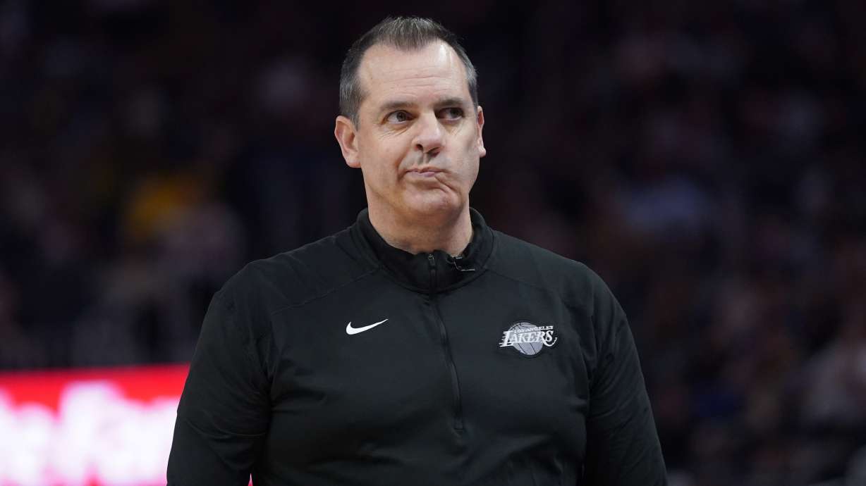 Los Angeles Lakers coach Frank Vogel walks along the sideline during the second half of the team's NBA basketball game against the Golden State Warriors in San Francisco, Thursday, April 7, 2022.