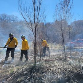 Sandy fire crews work to extinguish a fire at Dimple Dell Park. The mayor of Sandy took to social media on Monday to plead for information about three "suspicious" fires set in the park last week. 