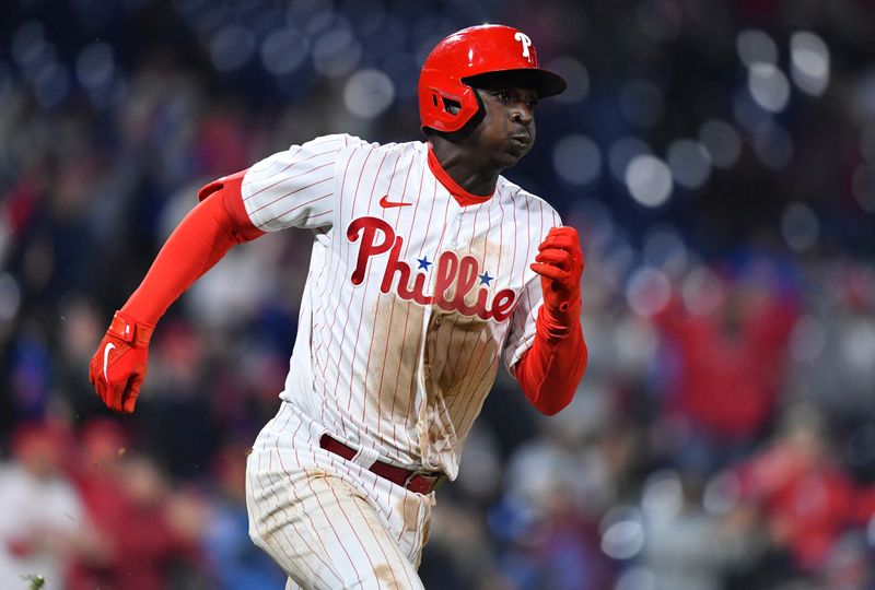 Apr 11, 2022; Philadelphia, Pennsylvania, USA; Philadelphia Phillies shortstop Didi Gregorius (18) rounds first after hitting an RBI double in the eighth inning against the New York Mets at Citizens Bank Park.