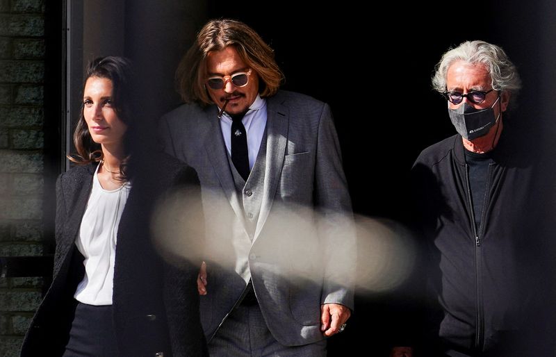 Johnny Depp departs from Fairfax County Circuit Courthouse following jury selection in the Johnny Depp defamation case against Amber Heard, in Fairfax, Va., Monday.