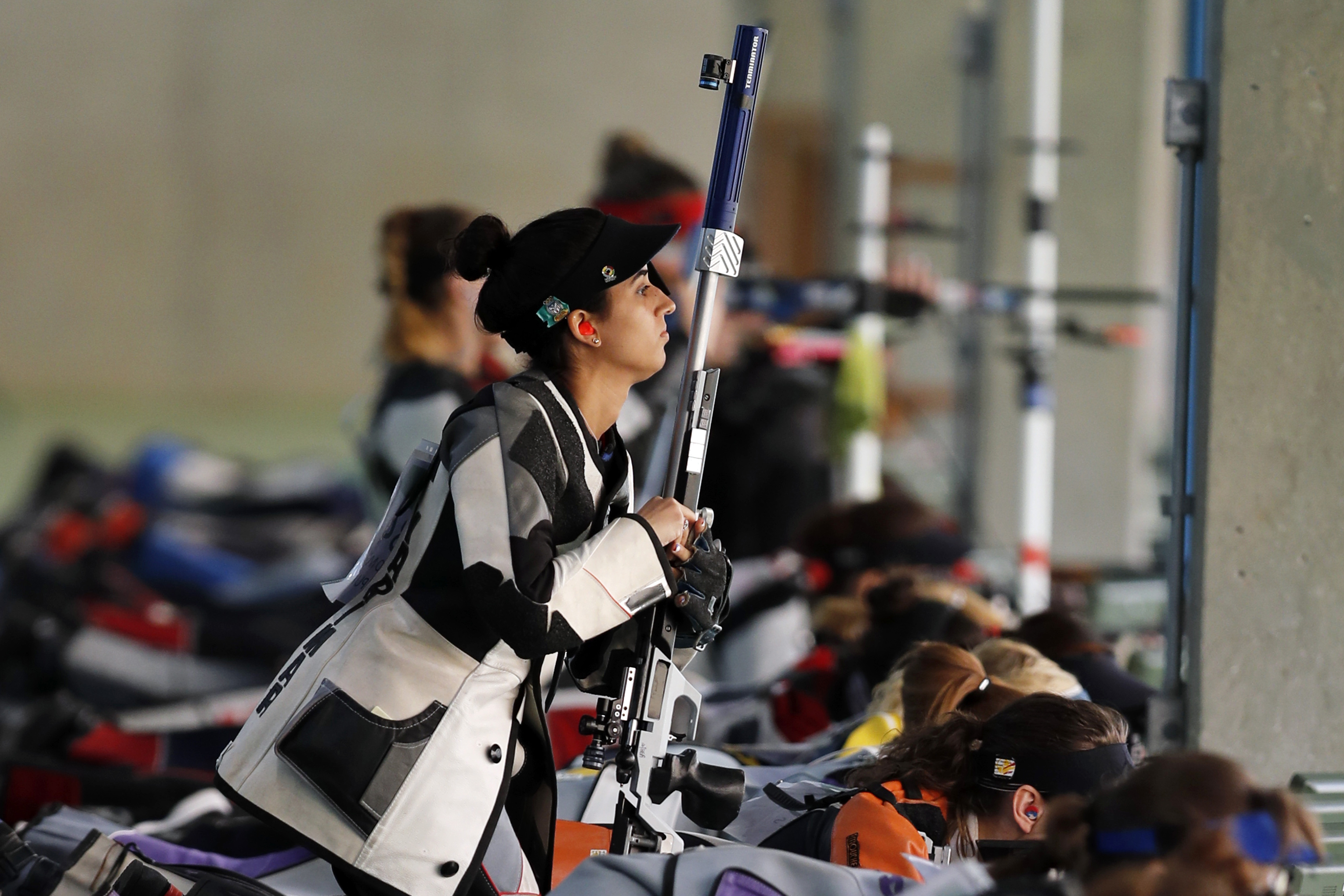 FILE - Yarimar Mercado Martinez, of Puerto Rico, competes during the women's 50-meter Rifle 3 Positions qualification, at the Olympic Shooting Center, during the 2016 Summer Olympics in Rio de Janeiro, Brazil, Aug. 11, 2016. Mercado Martinez's mother, Mabel Martinez, 56, was killed by a stray bullet in her Connecticut home over the weekend, authorities announced Monday, April 11, 2022. 