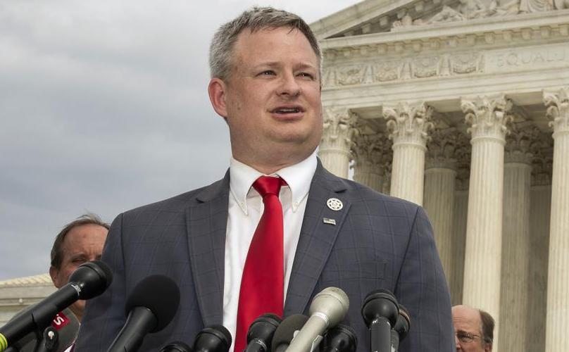 South Dakota Attorney General Jason Ravnsborg, speaks to reporters in front of the U.S. Supreme Court in Washington on Sept. 9, 2019. The South Dakota House impeached Ravnsborg Tuesday for his conduct before and after he struck and killed a pedestrian on a highway shoulder.