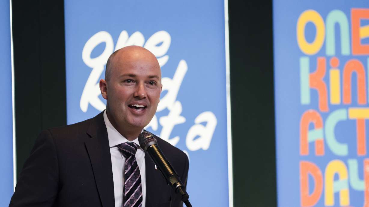 Gov. Spencer Cox speaks at the “One Kind Act A Day” global campaign launch celebration at Gallivan Center in Salt Lake City on Tuesday.