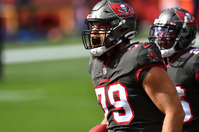 FILE PHOTO: Sep 27, 2020; Denver, Colorado, USA; Tampa Bay Buccaneers defensive end Pat O'Connor (79) celebrates his blocked punt football recovery in the first quarter against the Denver Broncos at Empower Field at Mile High.