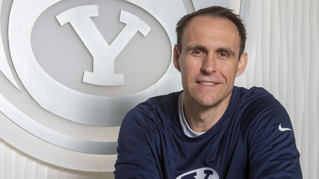 BYU assistant basketball coach Chris Burgess poses for photos while at the Marriott Center Annex in Provo on Friday, May 3, 2019.