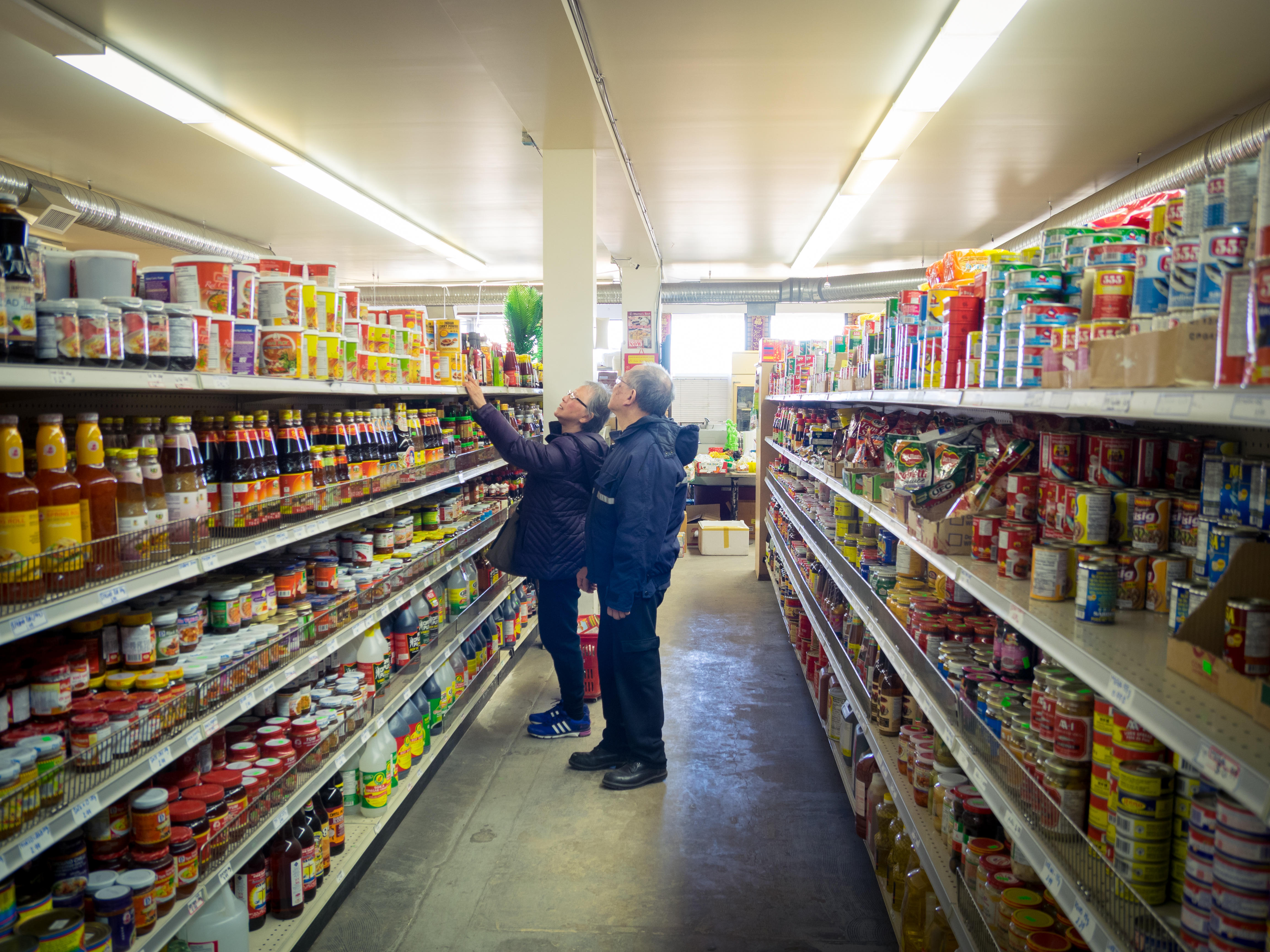 A senior couple shops at An-An Market, an Asian grocery store in Saskatchewan, Canada. Food prices have seen the biggest 12-month increase since the year ended May 1981, the Bureau of Labor Statistics reported.