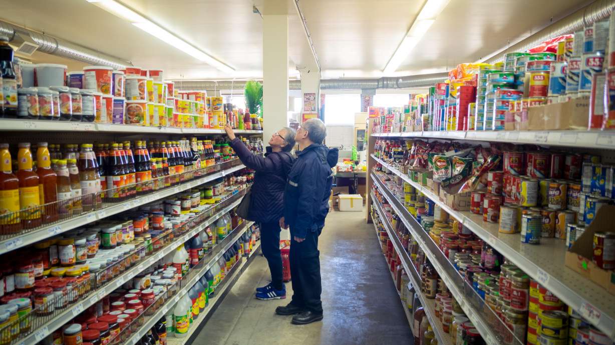 A senior couple shops at An-An Market, an Asian grocery store in Saskatchewan, Canada. Food prices have seen the biggest 12-month increase since the year ended May 1981, the Bureau of Labor Statistics reported.