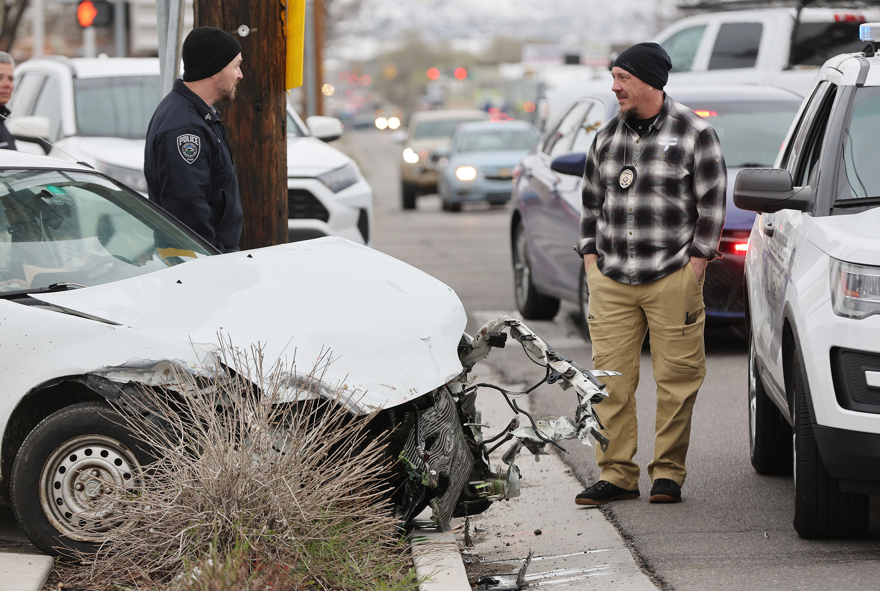 Unified Police investigate the scene of an collision on 700 East and 3300 South in Salt Lake City on Wednesday.