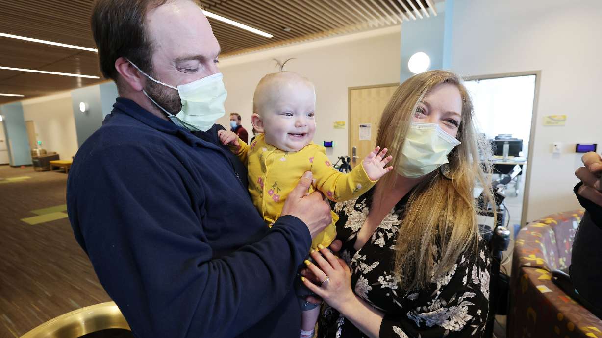 Nick and Alisha Keyworth celebrate the anniversary of the in utero fetal surgery performed on daughter Abigail at Primary Children’s Hospital in Salt Lake City on Wednesday. Abigail,11 months, has spina bifida and was the first in utero fetal surgery patient in the state of Utah.